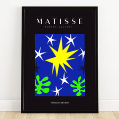 Modern abstract wall art print with blue background, yellow star, white stars, green leaves in black frame