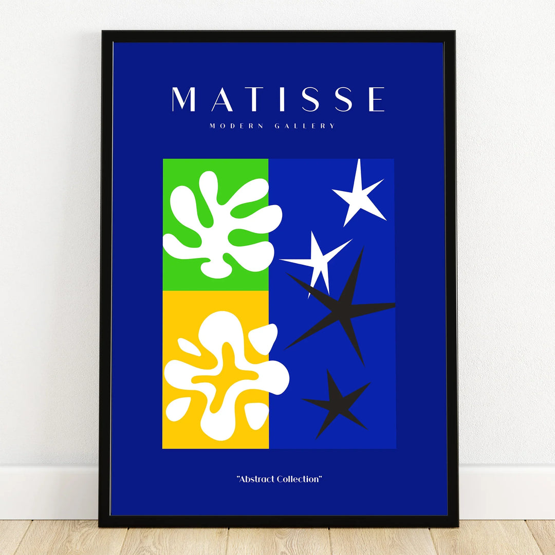 Framed modern abstract wall art print with bold blue, green, yellow, and white shapes
