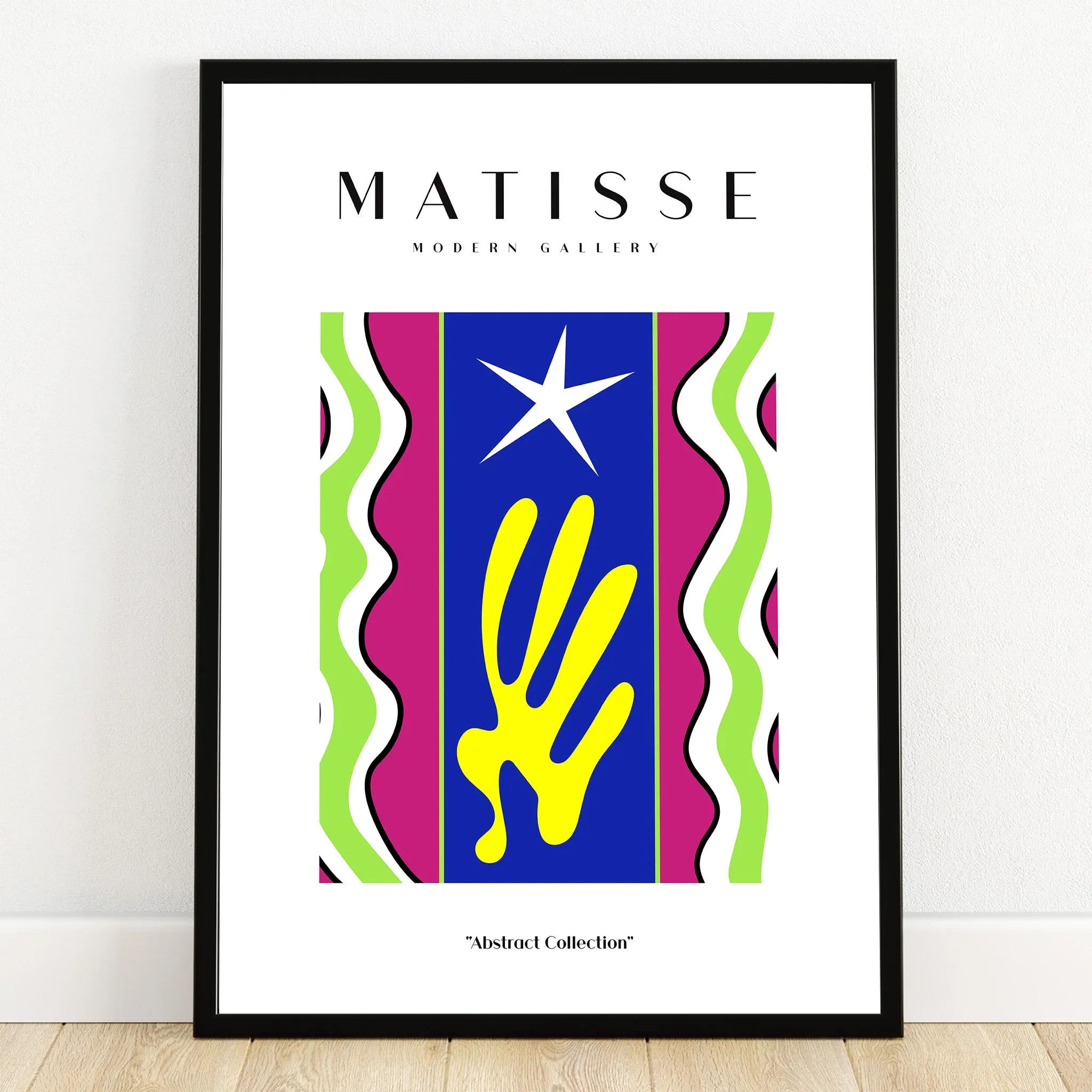 Colorful abstract art print with blue, yellow, green, and magenta shapes in black frame