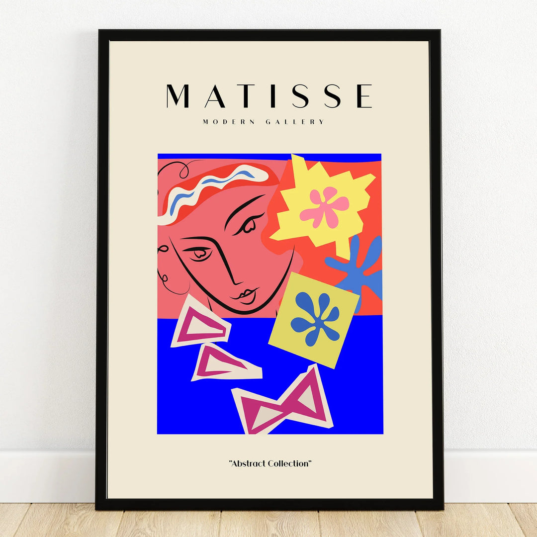 Matisse-style abstract wall art print with bold colors, face sketch, and floral shapes in black frame