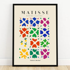 Colorful abstract wall art print in black frame with modern geometric shapes, beige background