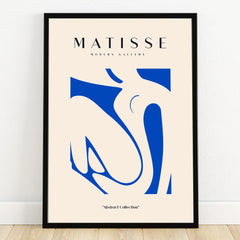 Framed abstract blue and beige Matisse-inspired wall art print in minimalist room