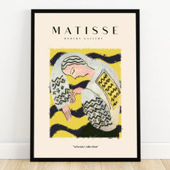 Framed abstract art print with a resting figure in colorful, modernist style on yellow background.