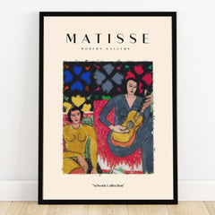 Framed Matisse art print with two abstract figures, one playing guitar, colorful modern wall decor.