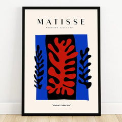 Abstract wall art poster with bold red and black leaf shapes on a blue background in black frame