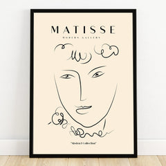 Minimalist abstract face line art print in black frame, Matisse-inspired wall decor.