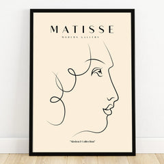 Minimalist line art face print in black frame, modern abstract wall art decor