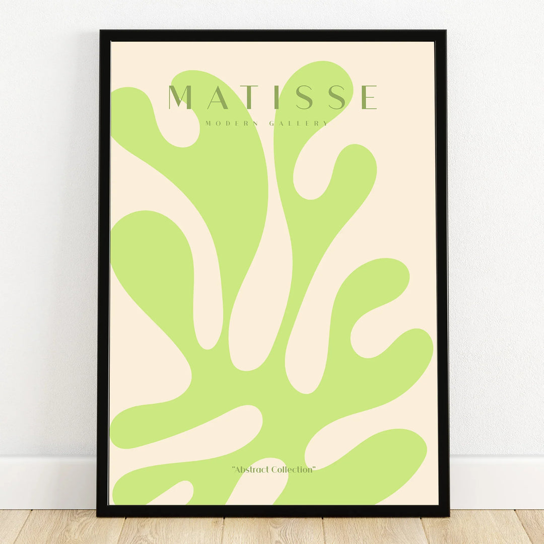 Modern framed abstract wall art print with light green organic shapes on beige background