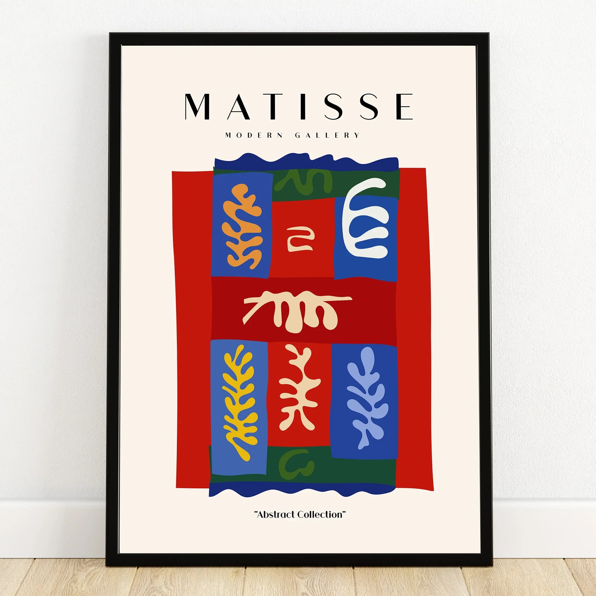 Colorful abstract art print inspired by Matisse, framed and leaning against a wall
