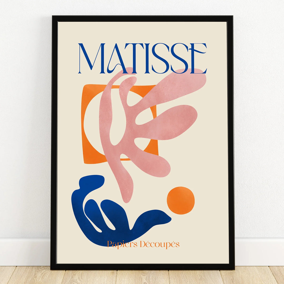 Framed abstract art print with colorful cut-out shapes and bold text for modern wall decor