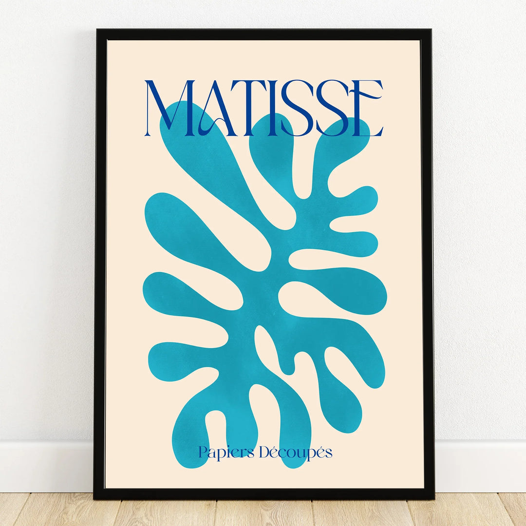 Framed Matisse-inspired abstract blue cutout print on beige background, modern wall art