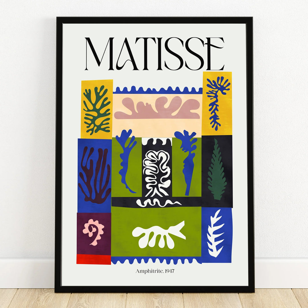 Matisse-inspired abstract wall art print in black frame with colorful cut-out shapes
