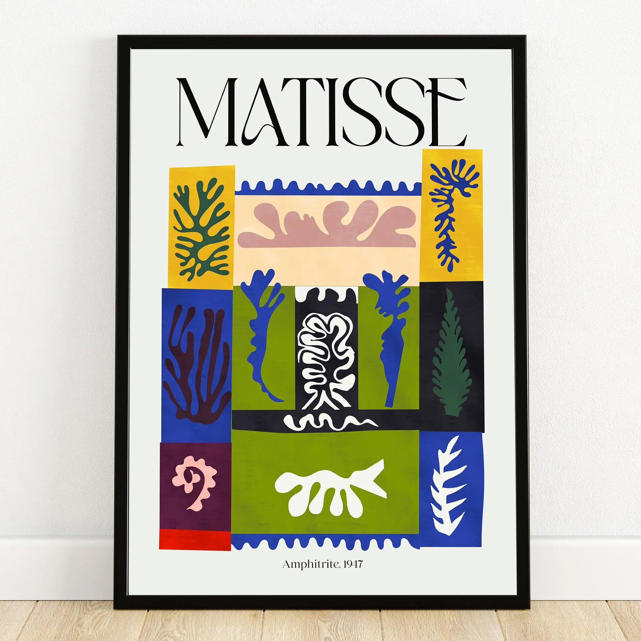 Matisse-inspired abstract wall art print in black frame with colorful cut-out shapes
