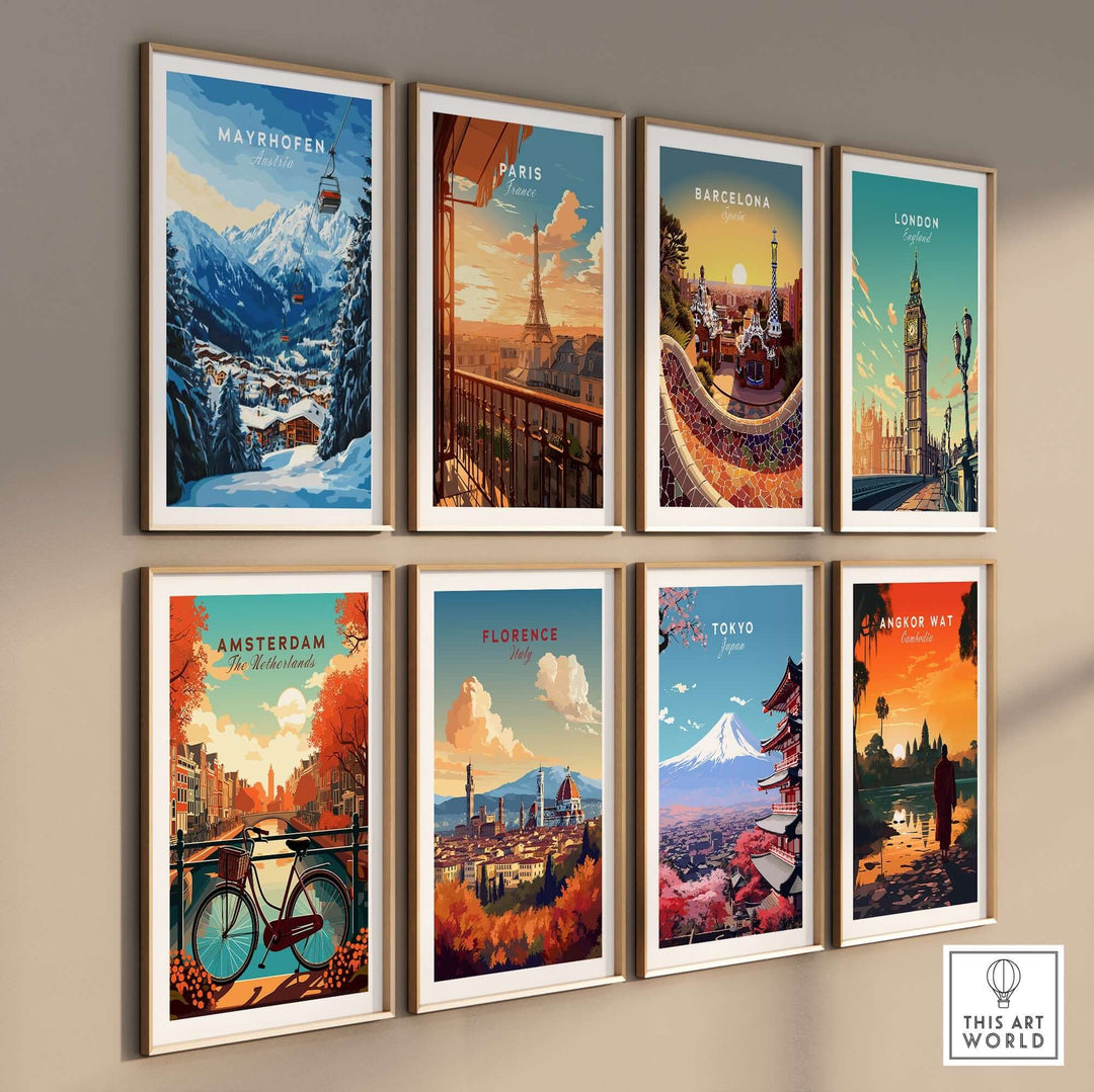 Collection of colorful city prints including Mayrhofen, Paris, Barcelona, and Tokyo displayed on a wall.