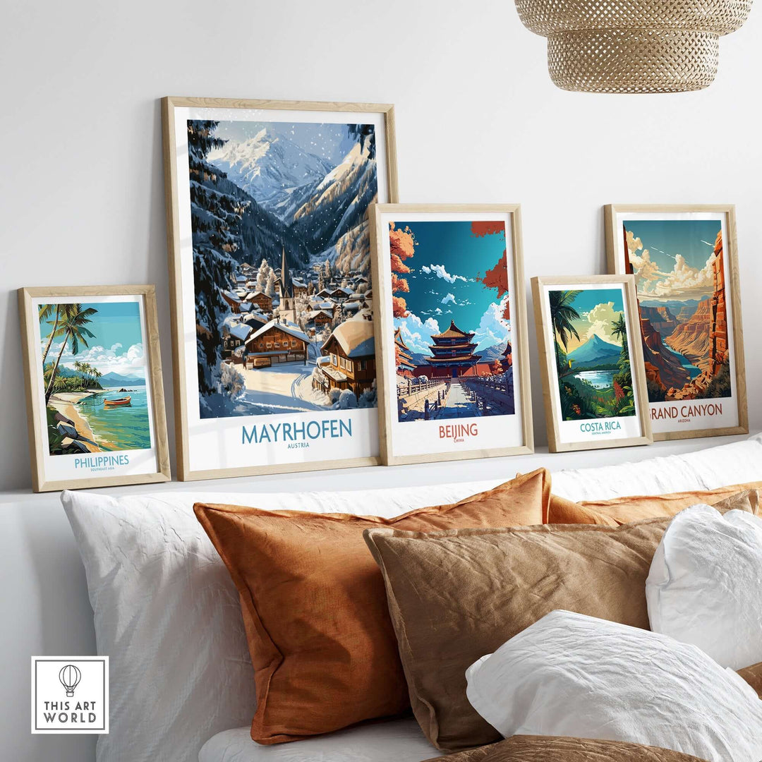 Mayrhofen Ski Wall Art Poster displayed among other travel-themed art prints on a cozy living room wall.