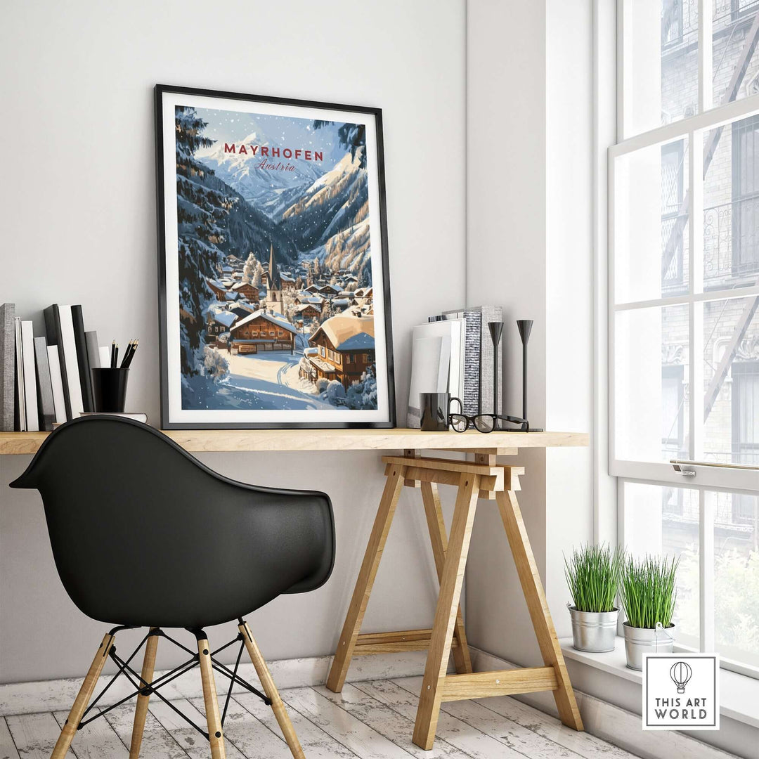 Mayrhofen Ski Wall Art Print displayed in a modern office setting, showcasing a snowy mountain chalet scene.