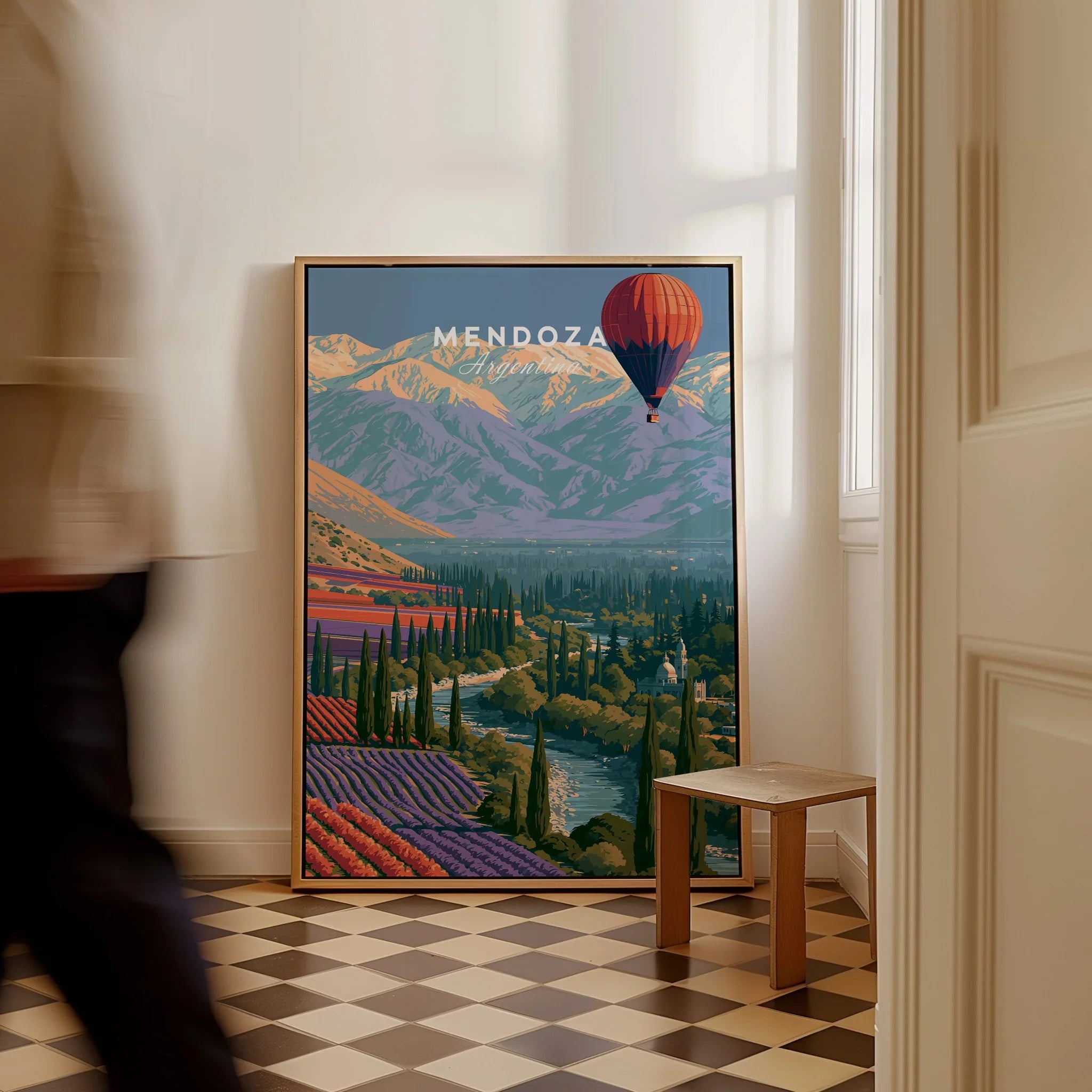 Mendoza Argentina Balloon Travel Poster — framed canvas on floor man walking past