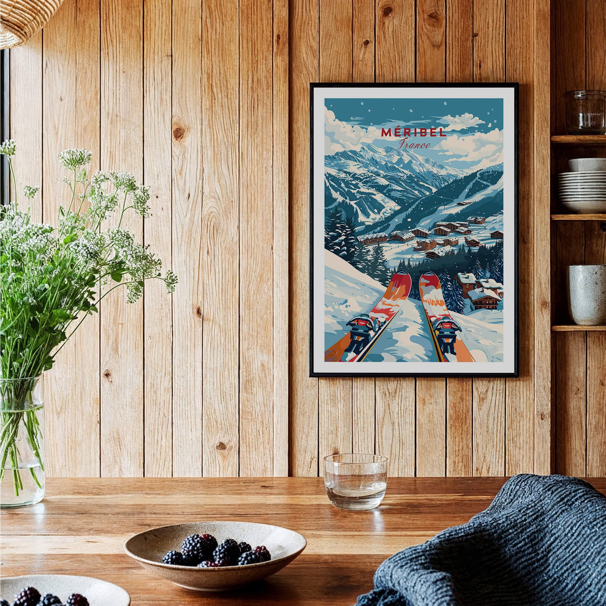 Meribel Ski Poster - France displayed in a cozy interior, showcasing snowy mountains and vibrant ski culture.