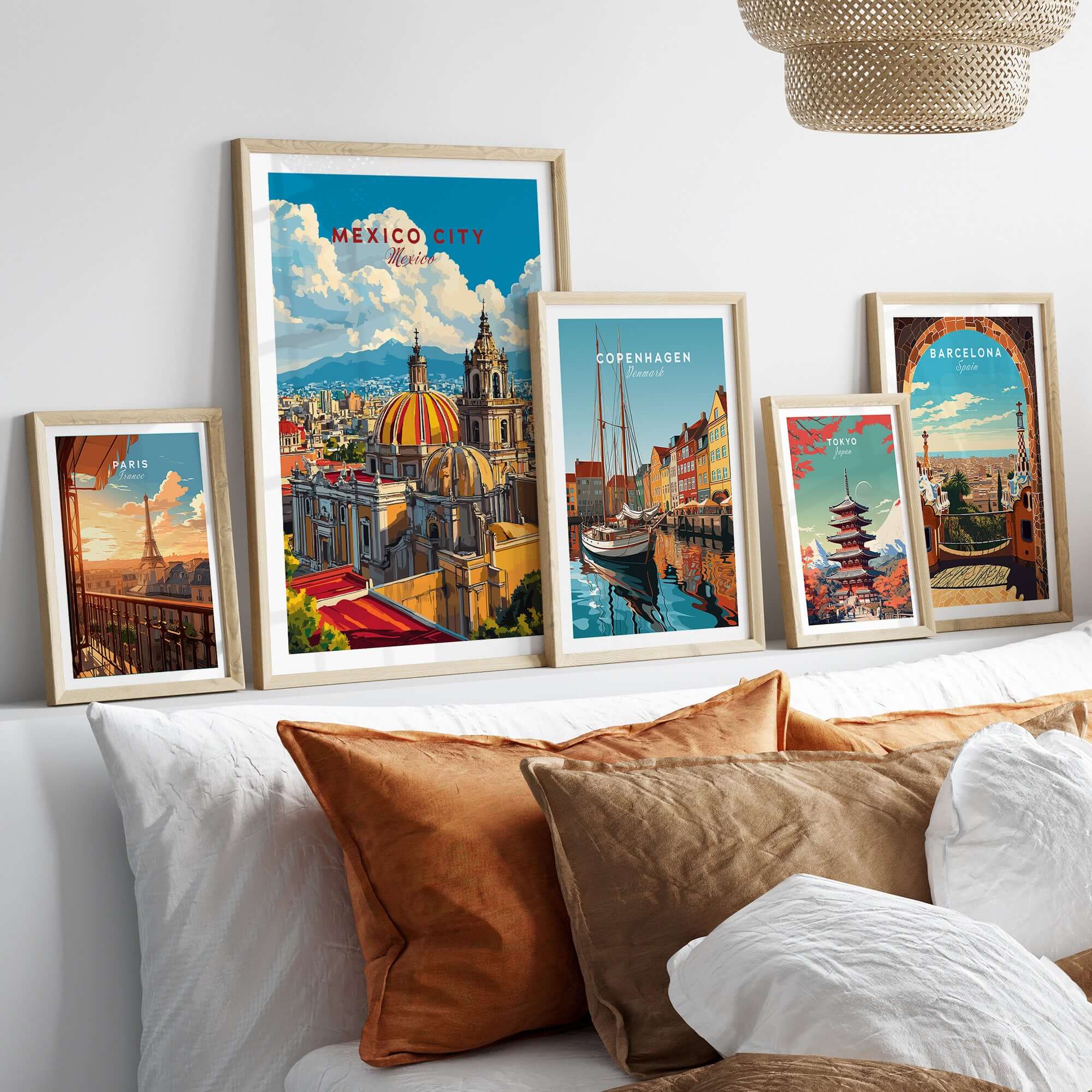 Mexico City Art Print - Cityscape Wall Poster displayed among other city art prints on a cozy sofa.
