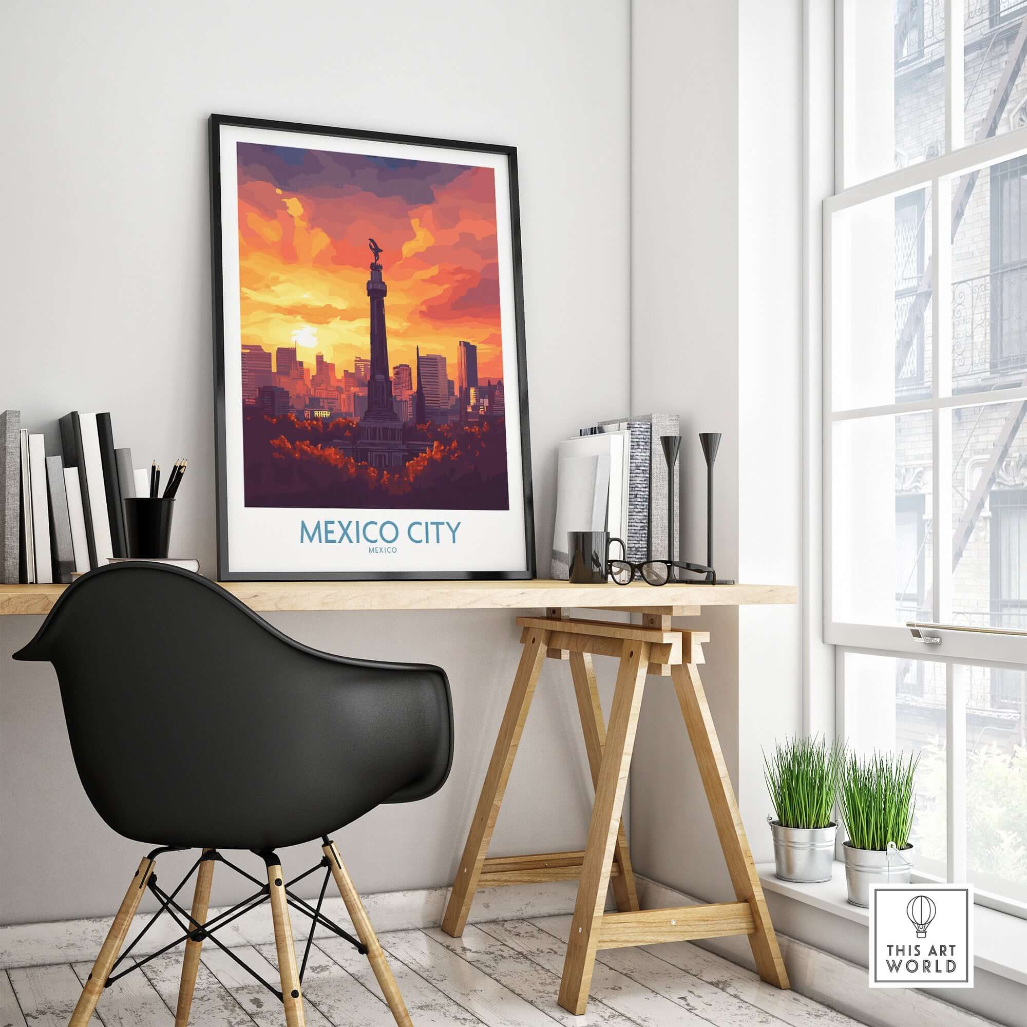 Mexico City Travel Poster - El Ángel framed on wall above a stylish desk in modern indoor setting.