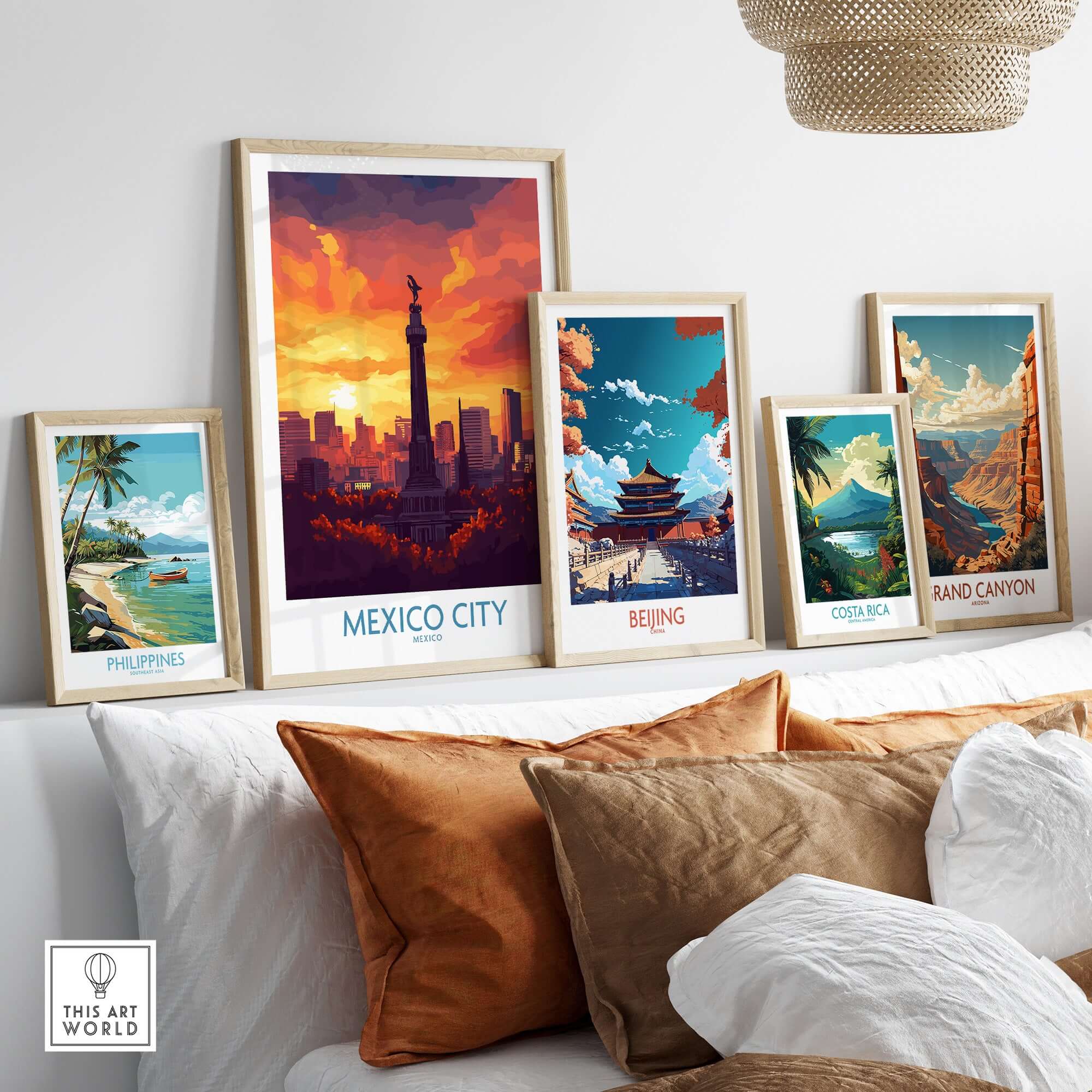 Mexico City Travel Poster - El Ángel displayed among other travel posters on a stylish interior wall.