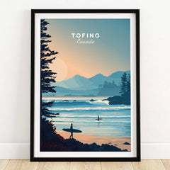 Tofino Canada art print with surfers, sunset coastline, and mountains in black frame.