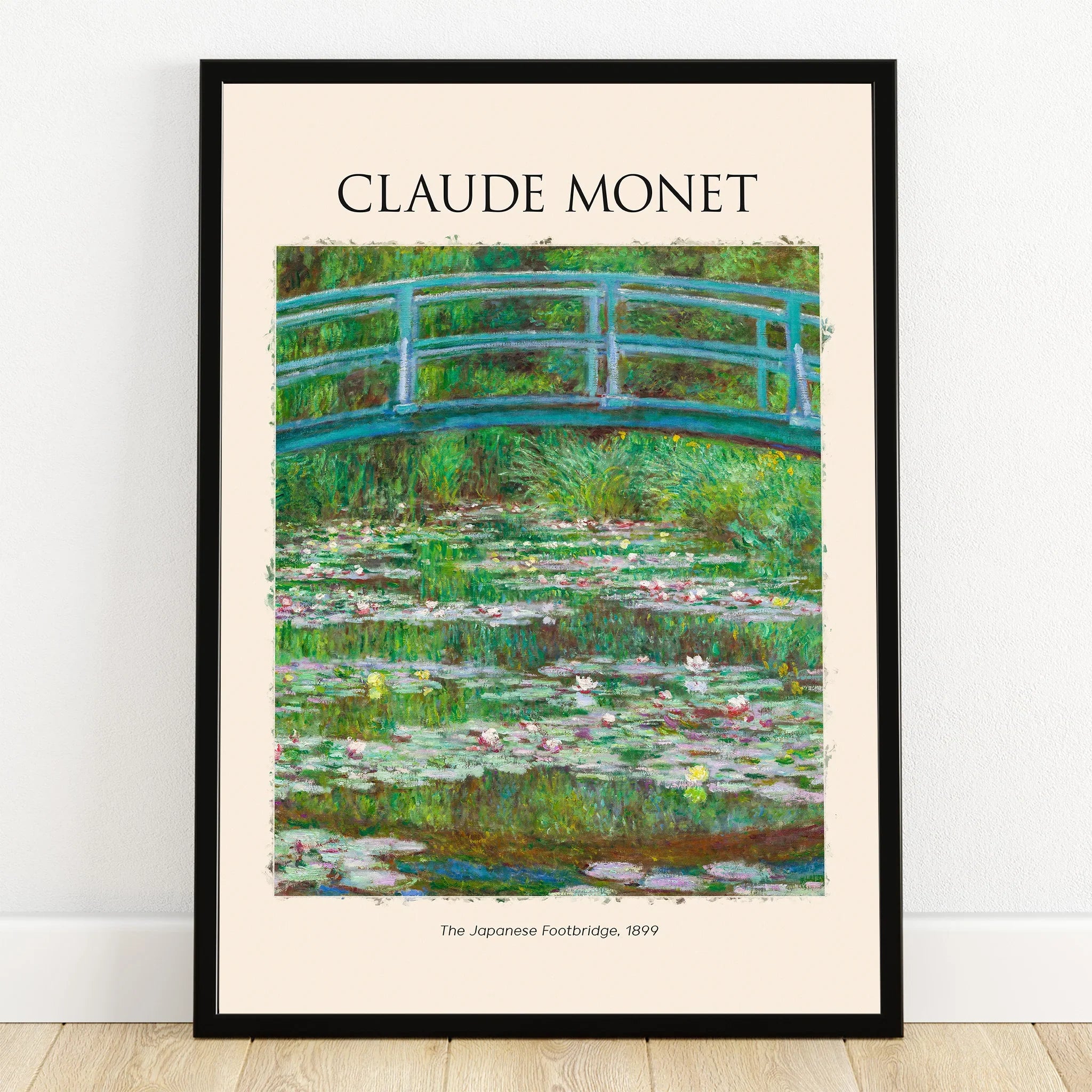 Claude Monet art poster of The Japanese Footbridge, with water lilies, in a black frame