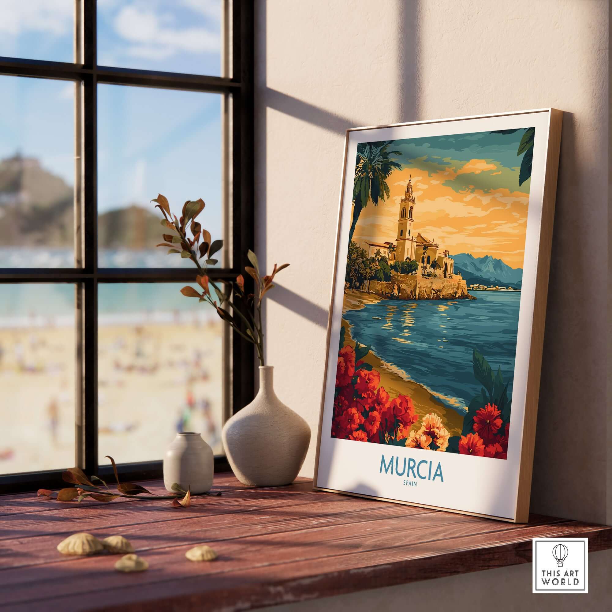Murcia Spain Poster displayed on a wooden table by the window with beach view and colorful floral accents.
