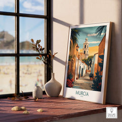 Murcia Spain Travel Poster displayed on a windowsill with beach view, showcasing vibrant colors and iconic landmarks.