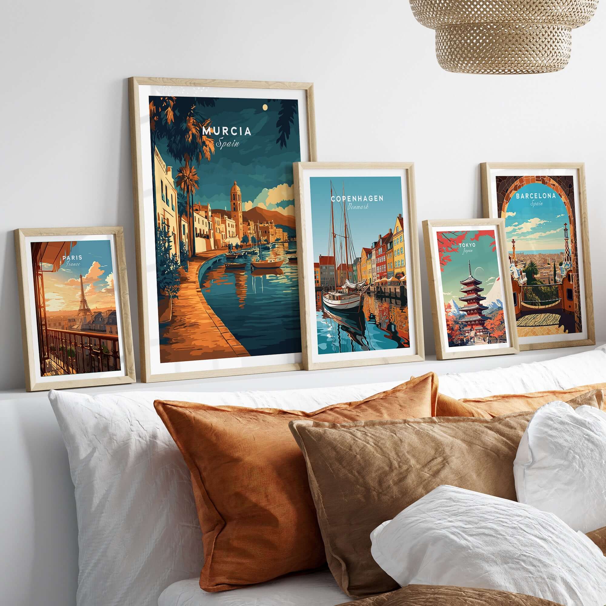 Murcia Wall Art featuring stunning prints of Spain, Copenhagen, and Barcelona displayed in stylish frames.