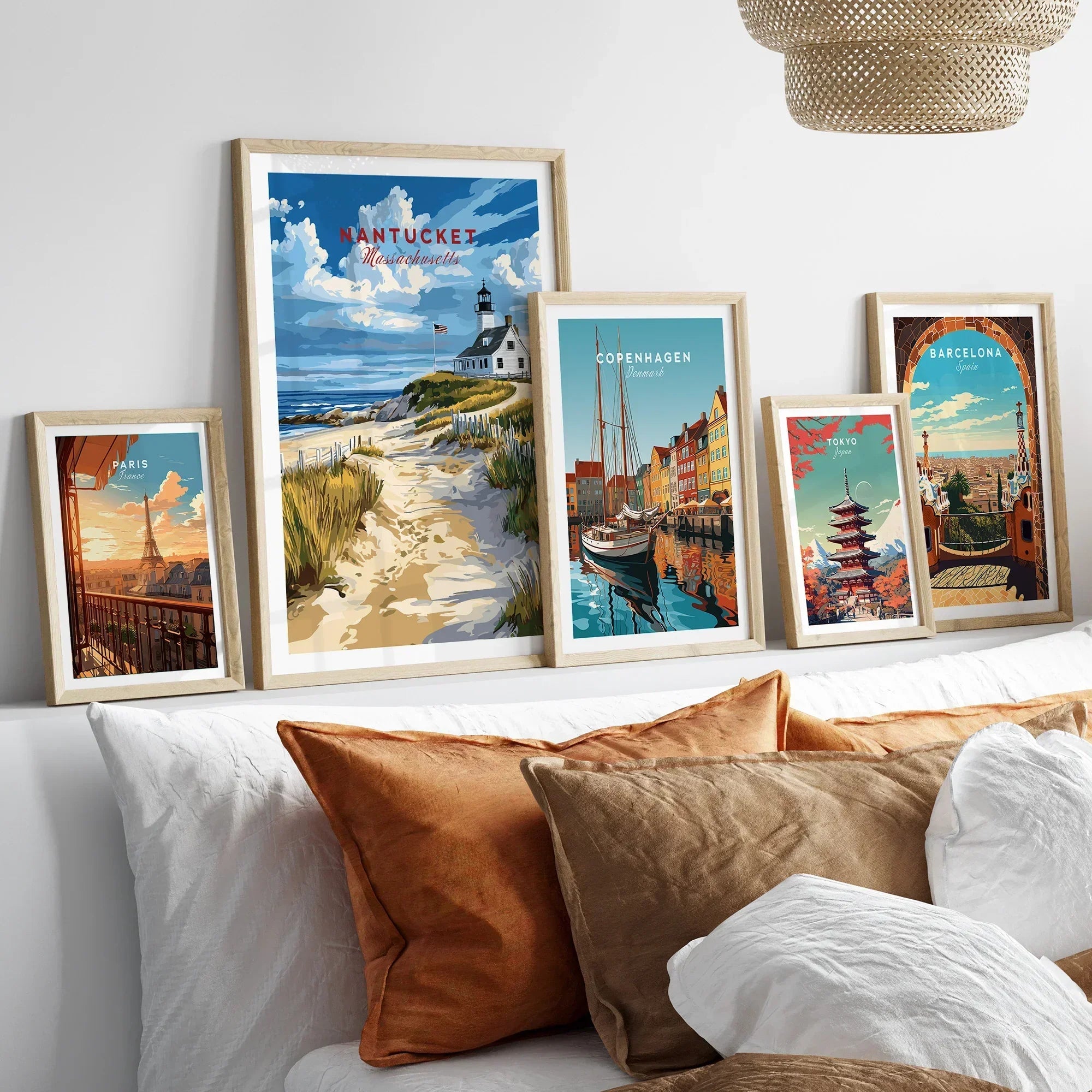 Travel posters of Paris, Nantucket, Copenhagen, Tokyo, and Barcelona for wall art decor