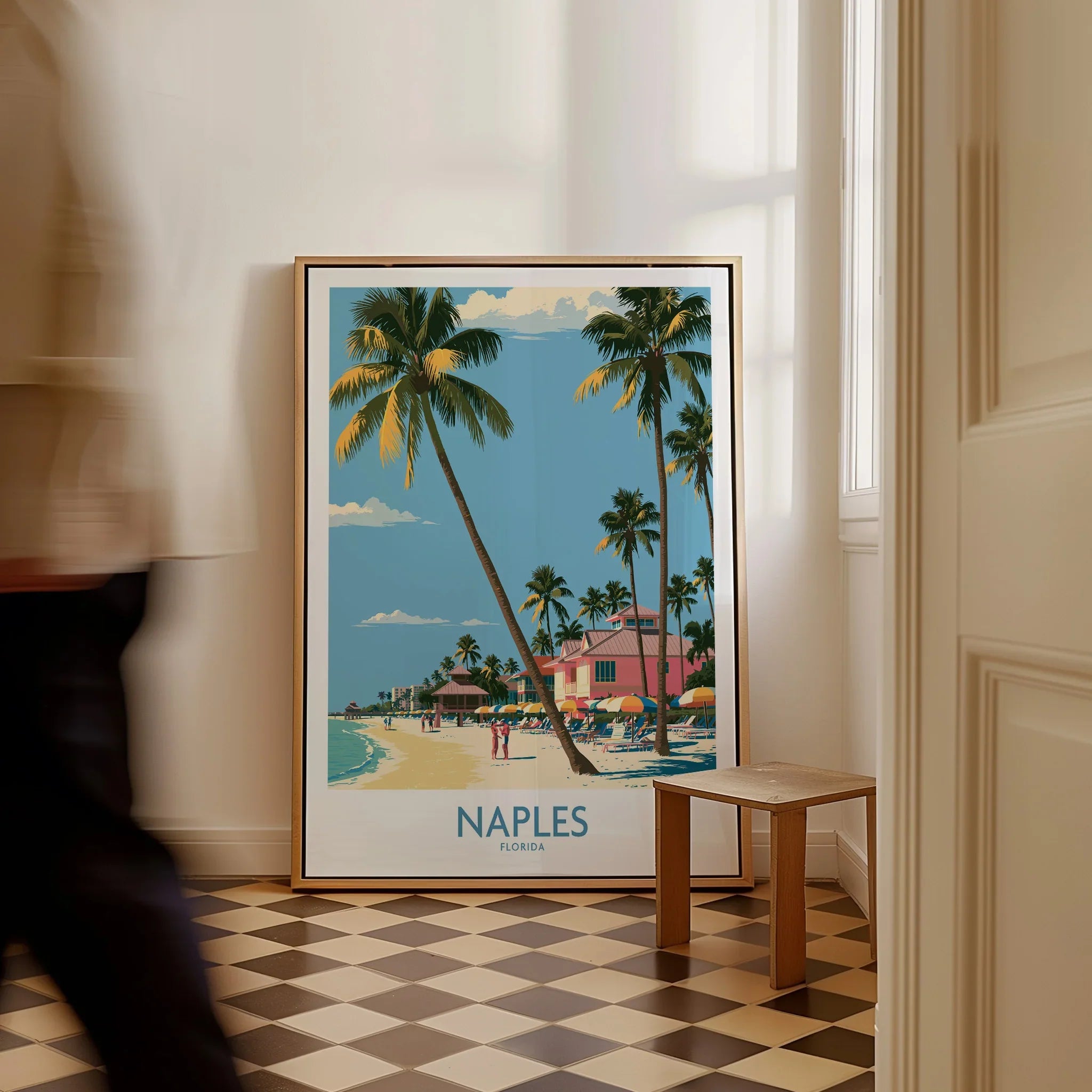 Naples Florida Shore Wall Art — framed canvas on floor man walking past