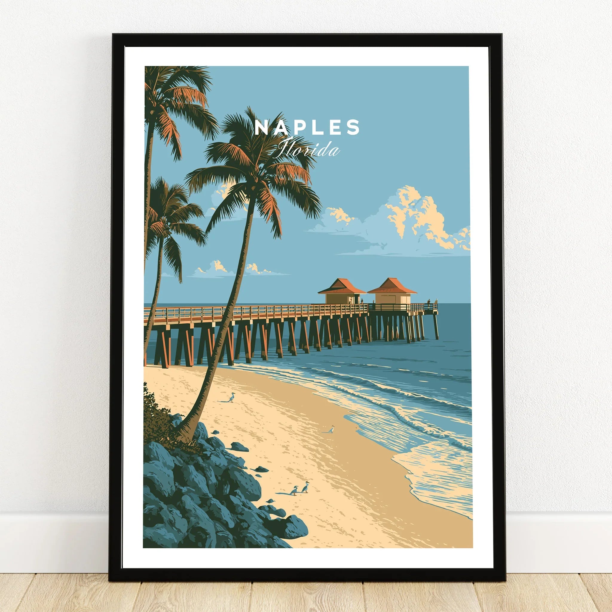 Naples Florida Pier Travel Poster — art print in black frame on wooden floor