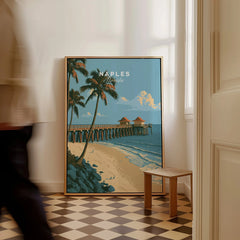 Naples Florida Pier Travel Poster — framed canvas on floor man walking past