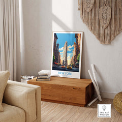 Stunning New York City wall art featuring the iconic Flatiron Building and yellow cabs in a cozy living room setting.