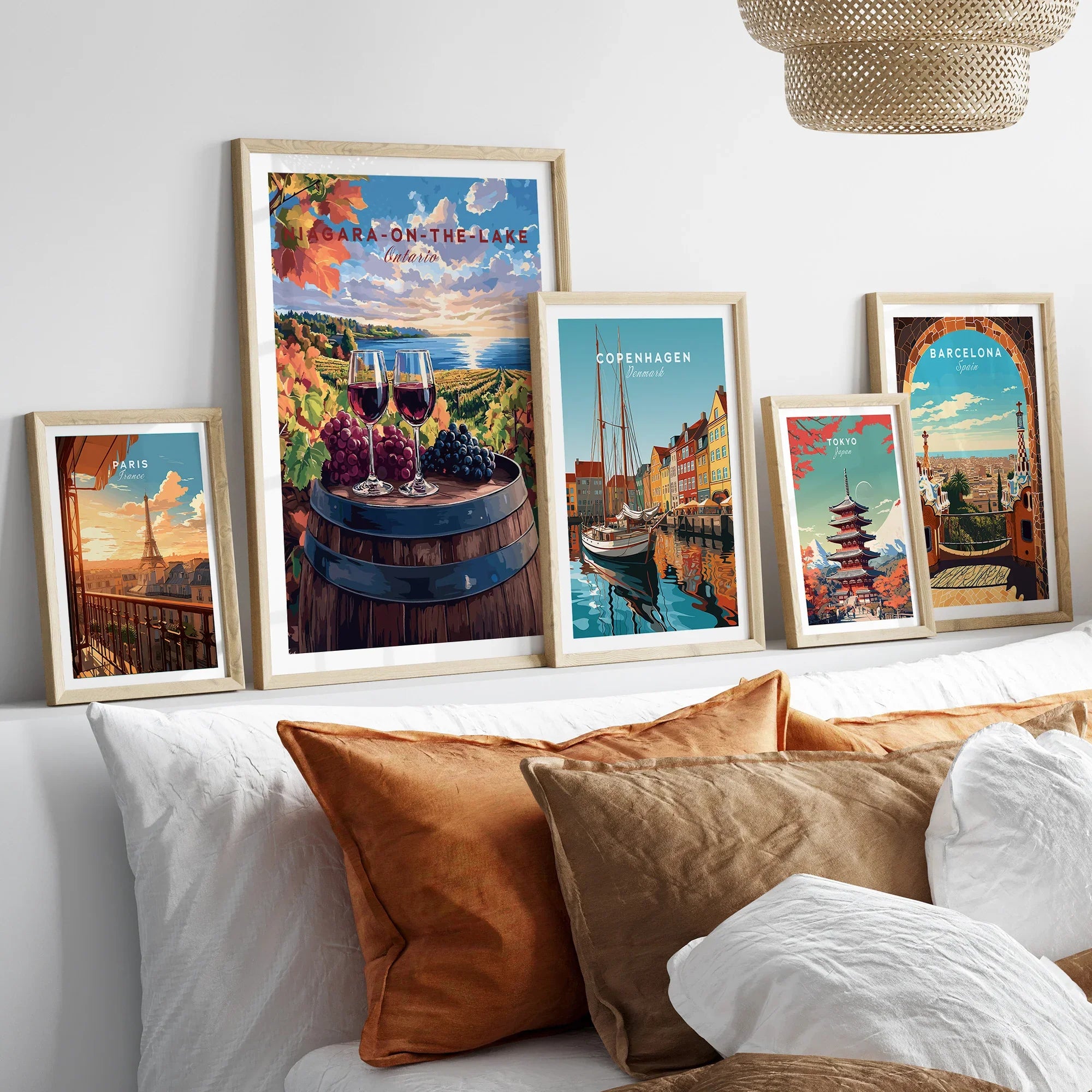 Framed travel posters of Paris, Niagara, Copenhagen, Tokyo, and Barcelona for home wall art decor
