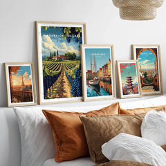 Framed travel posters of Paris, Niagara-on-the-Lake, Copenhagen, Tokyo, and Barcelona for wall art decor