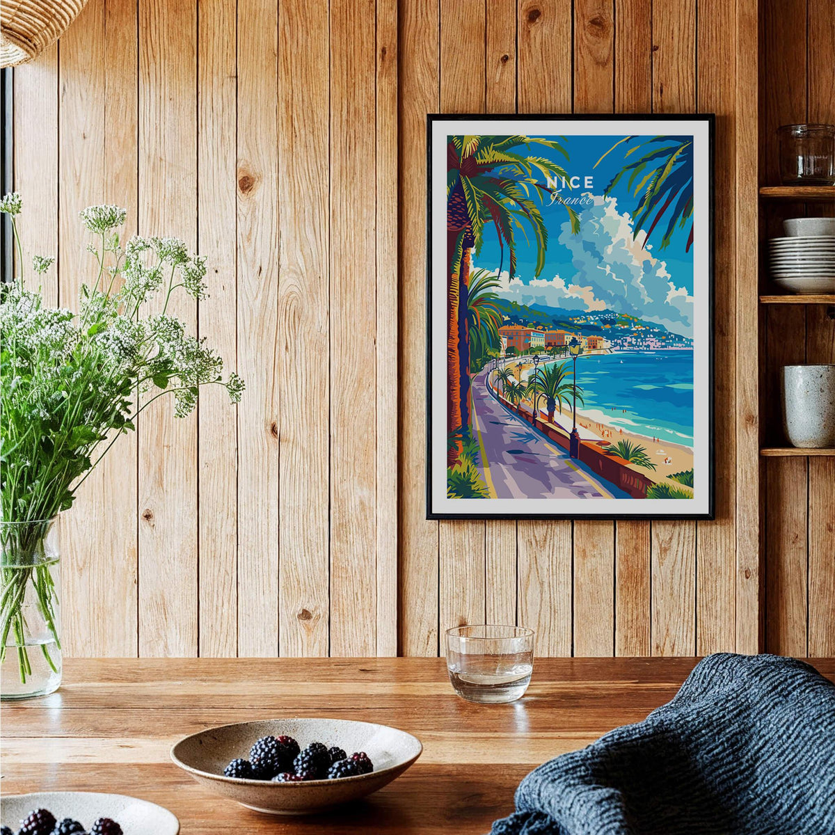 Nice Print - France beautiful poster of the French Riviera on a wooden wall, surrounded by plants and decor.