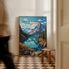 Framed North Cascades National Park travel poster on checkered floor with a person walking by