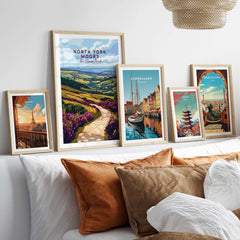 Framed North York Moors Art Print among other travel-themed art prints on a stylish home decor display.