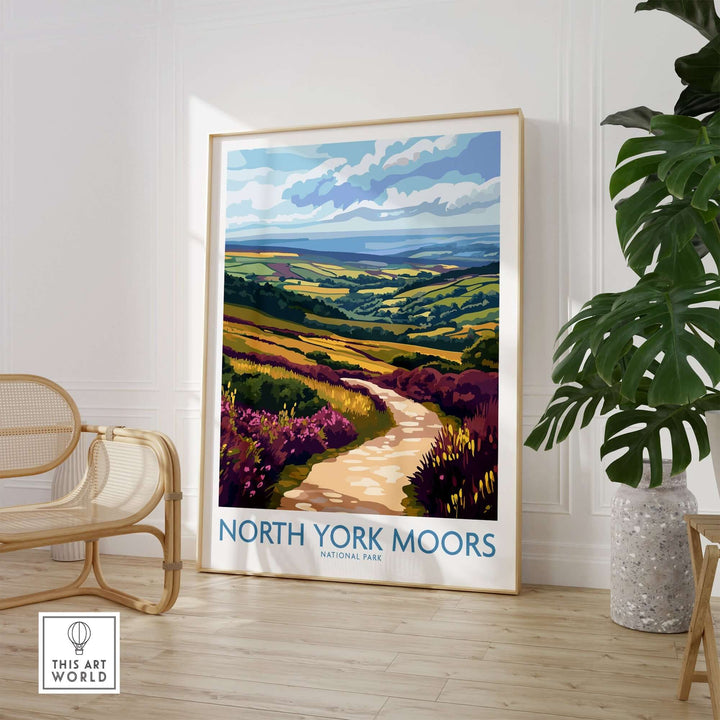 North York Moors National Park poster in a bright room with decorative plant and seating, showcasing vibrant landscapes and colors.