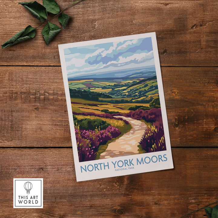 North York Moors National Park poster featuring vibrant landscapes and a scenic path on a rustic wooden table.