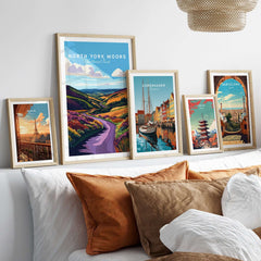 North York Moors National Park Print displayed among other city-themed prints in a cozy living room setting.