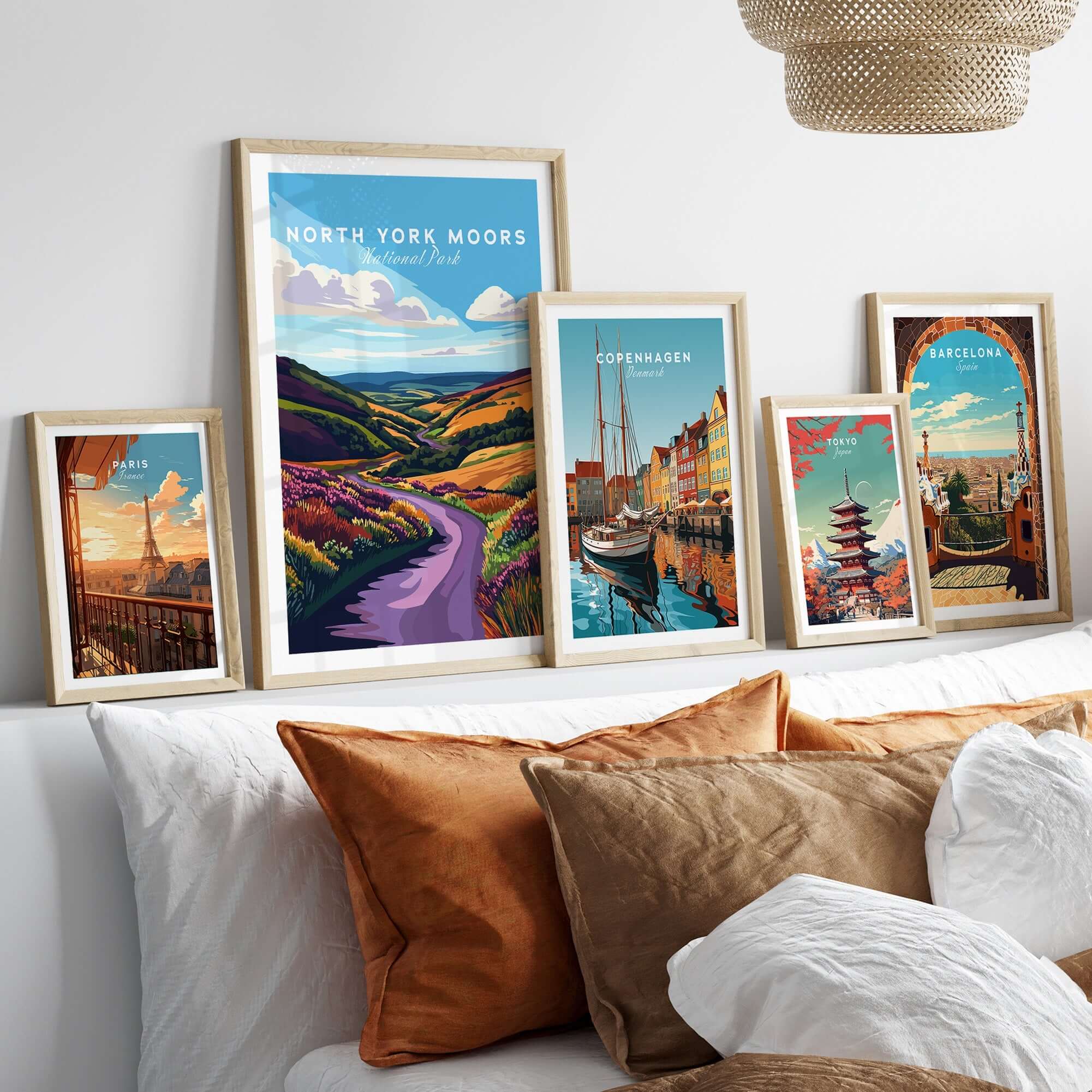 North York Moors National Park Print displayed among other city-themed prints in a cozy living room setting.