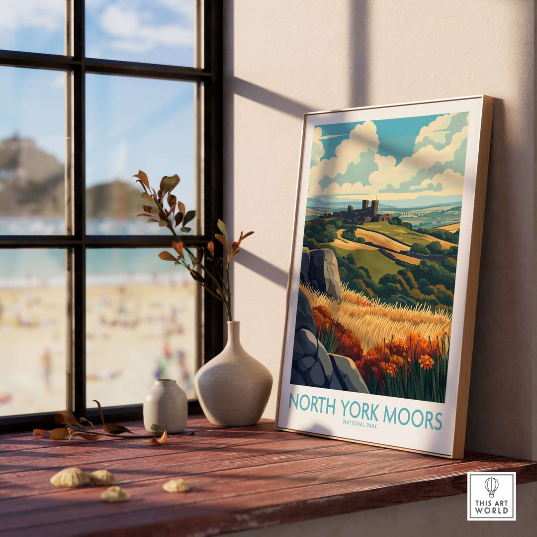 North York Moors poster showcasing vibrant landscape and colors, displayed in a bright room by a window.