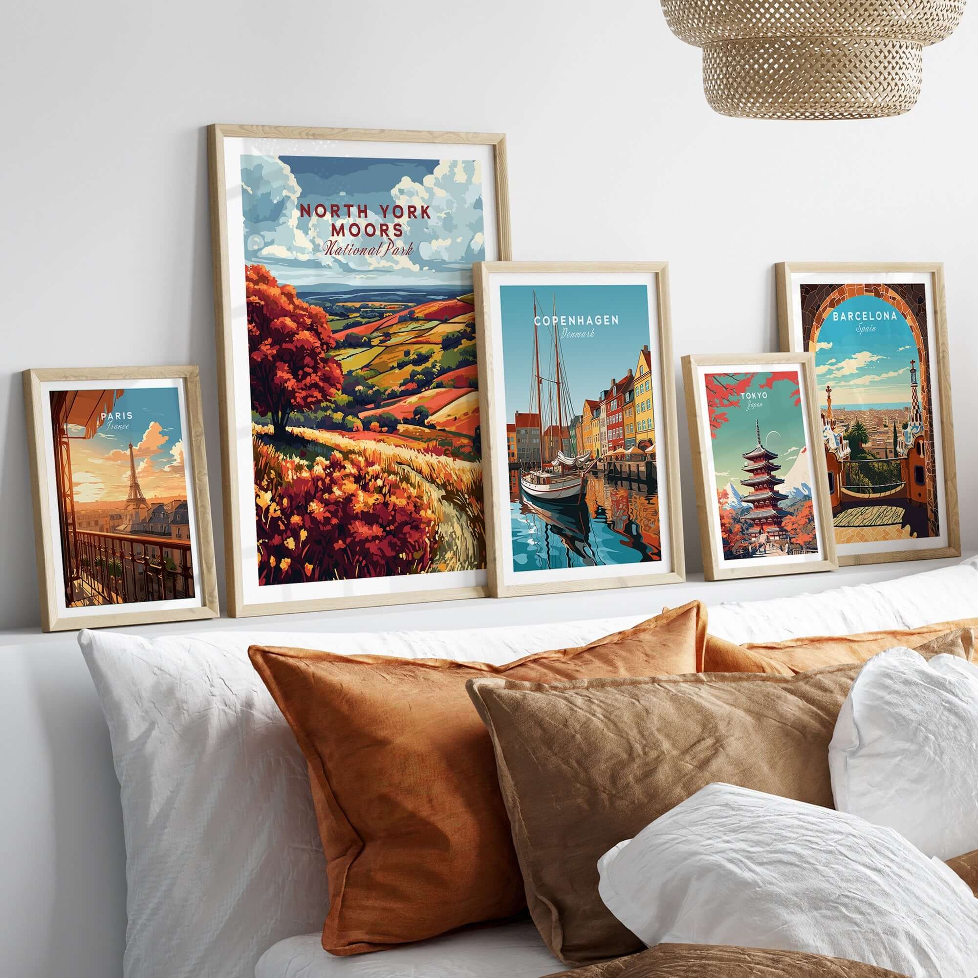 North York Moors Wall Art displayed in framed images on a stylish wall above a cozy bed.