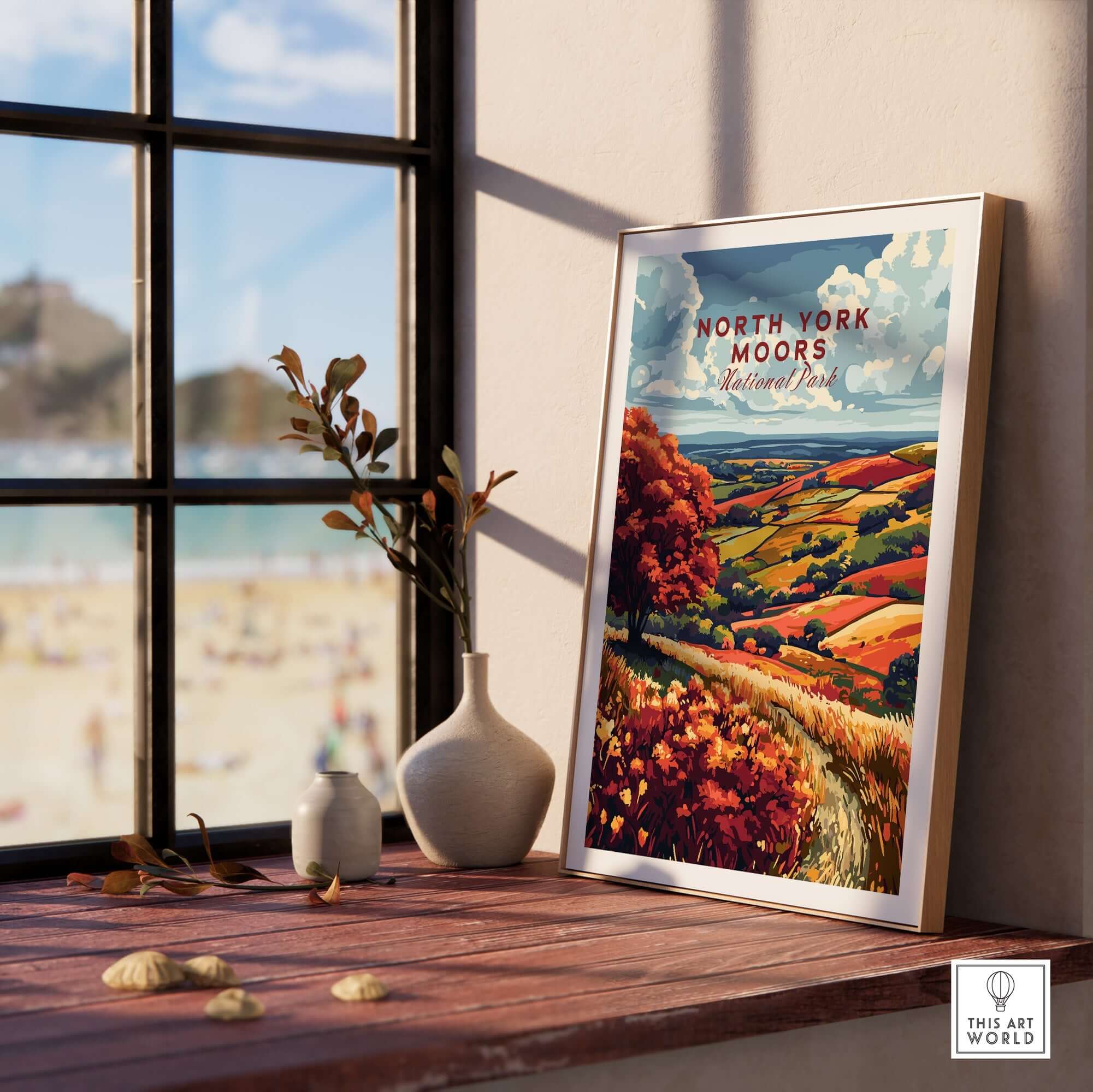 North York Moors Wall Art displayed on a wooden table near a window with a scenic view.