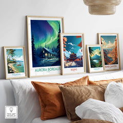Northern Lights Poster displayed alongside travel-themed prints on a stylish shelf with warm decor.