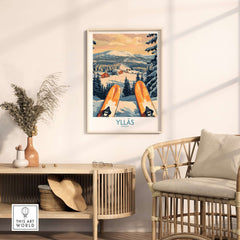 Ylläs snowy cabin print featuring skis on a slope, showcasing winter's beauty for home decor.