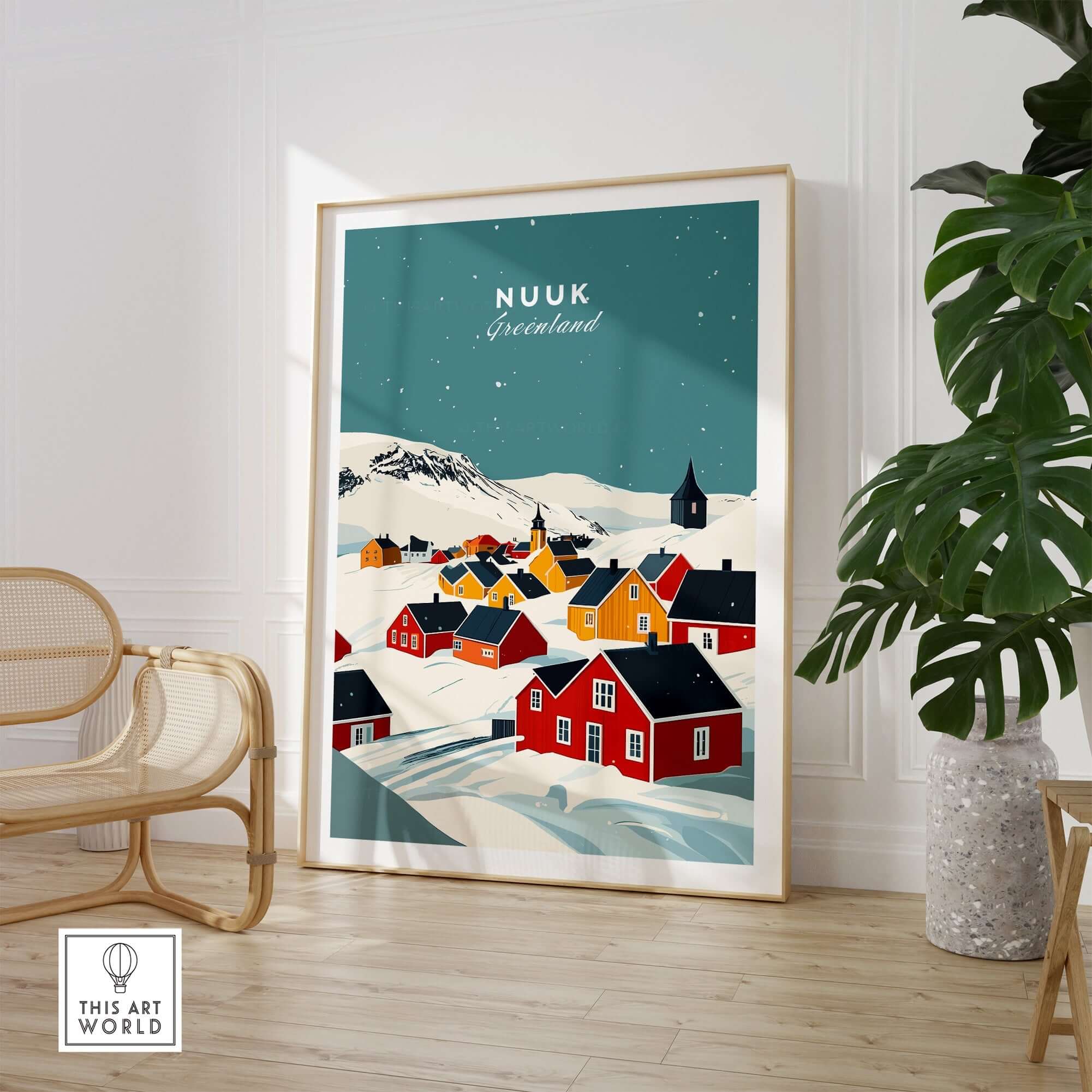 Stunning Nuuk Greenland Print displayed in a cozy living room setting, showcasing colorful houses and snowy landscapes.